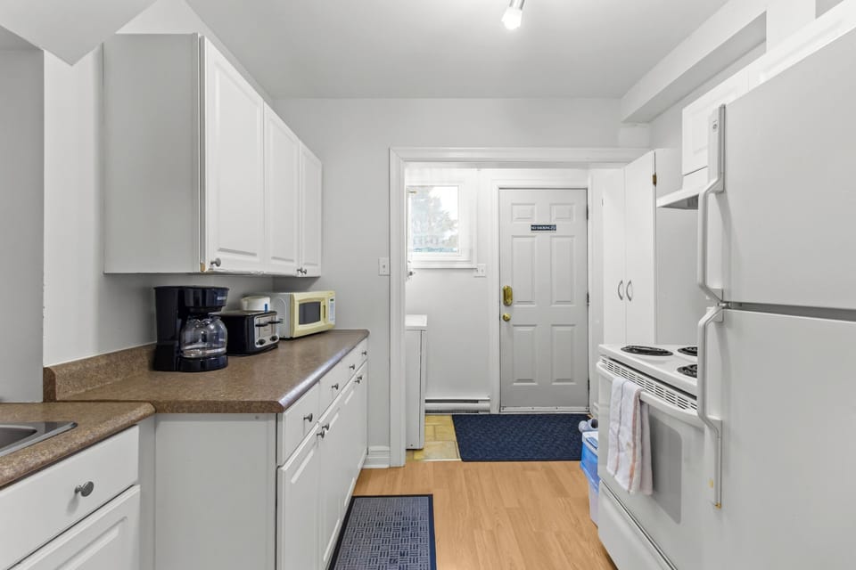 Fully Equipped Kitchen - Cook and step out with ease.
