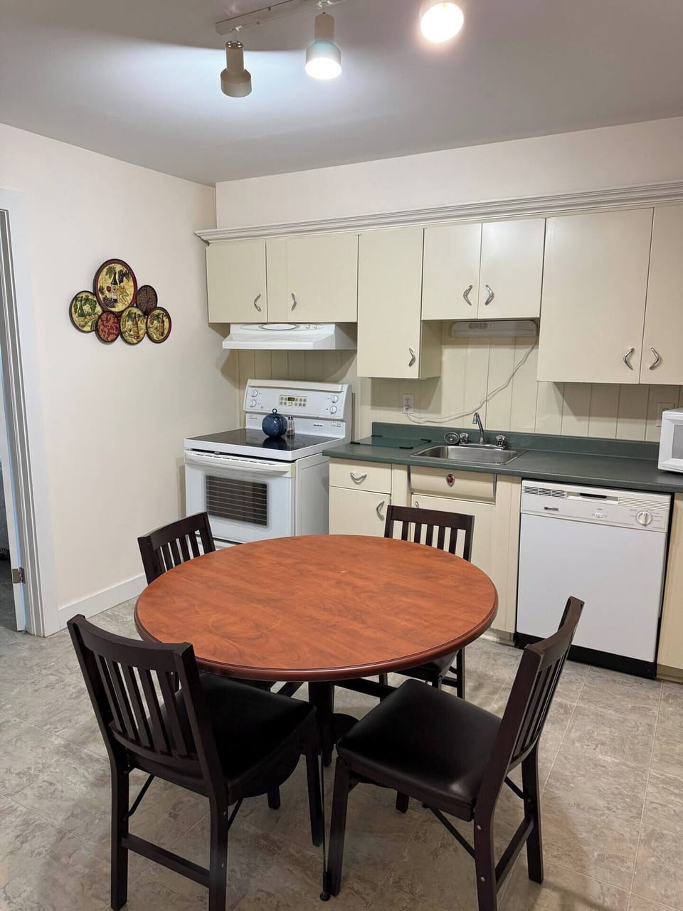 Your cozy dining nook with easy kitchen access—just like home.