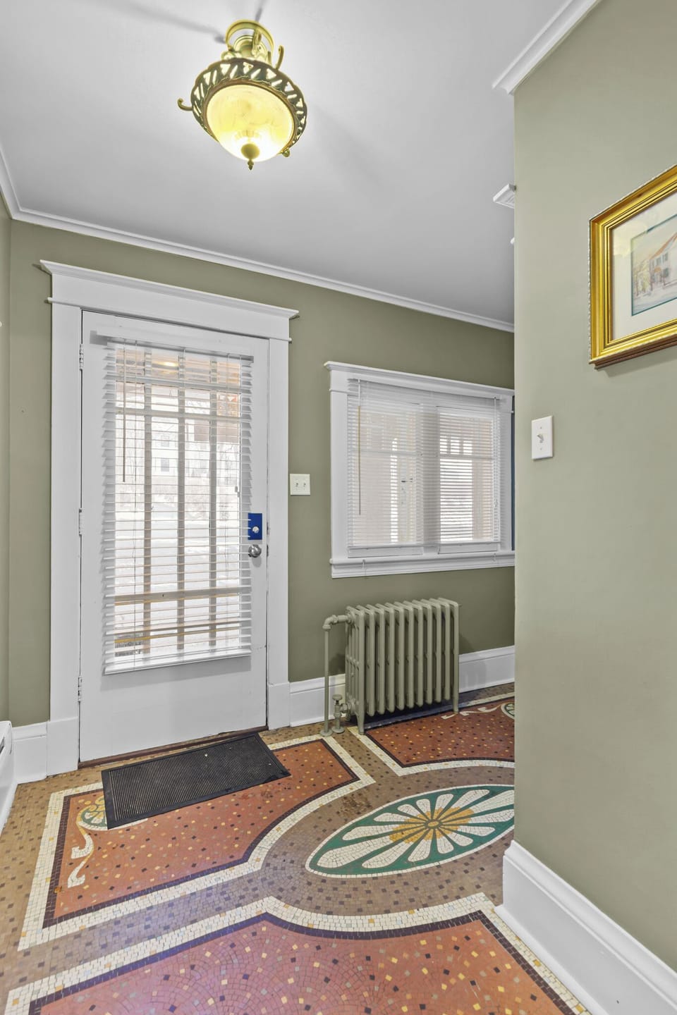 Private Entrance: Secure and private guest entry featuring a bright door with built-in blinds and a smart lock for easy, keyless self-check-in.