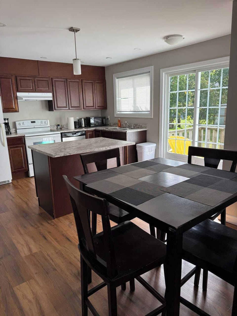 Whip up delicious meals in our fully equipped kitchen, then enjoy them together at the spacious dining table.