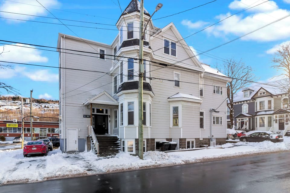 A view of the stately Victorian-style home. This well-located property offers character and convenience in a quiet neighborhood.