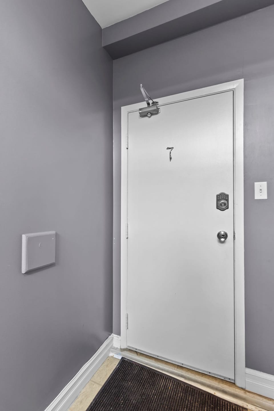 elcome home! A clean and secure entrance to your private suite, ensuring safety and privacy throughout your stay.