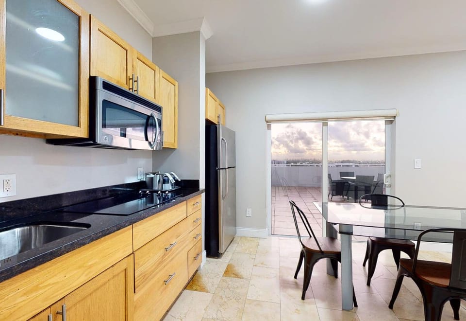 Family Suite, Terrace | Private kitchen | Microwave, coffee/tea maker