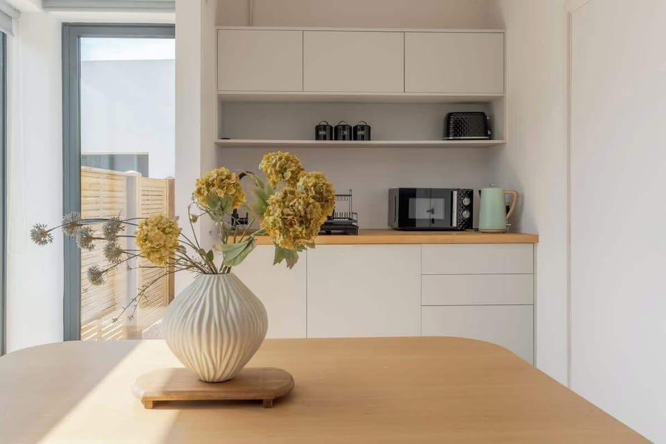Sleek, modern kitchen with everything you need for relaxed meals in your private retreat.