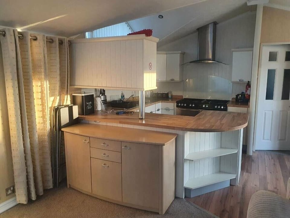 Fridge, microwave, toaster, cookware/dishes/utensils