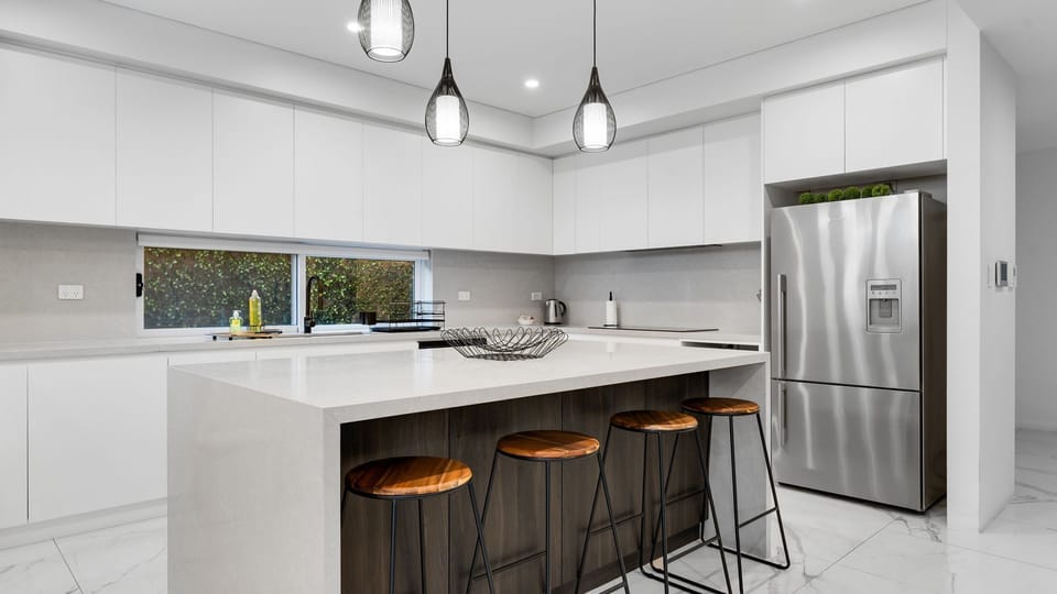 Bright kitchen with bar-style seating