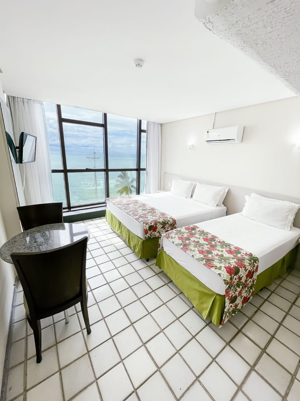 Executive Triple Room, Sea View | Minibar, in-room safe, blackout drapes, free cribs/infant beds