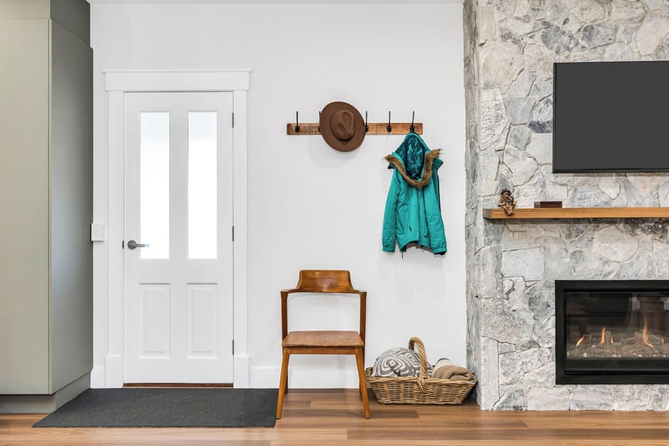 back door leading to wrap around verandah, stone gas fireplace 