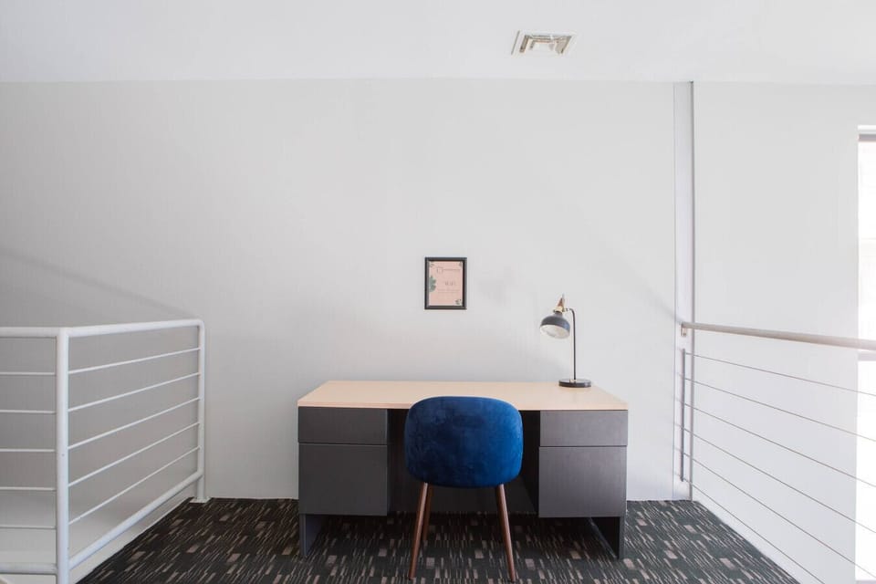 Exclusive resident clubroom featuring a game lounge and community kitchen for relaxing