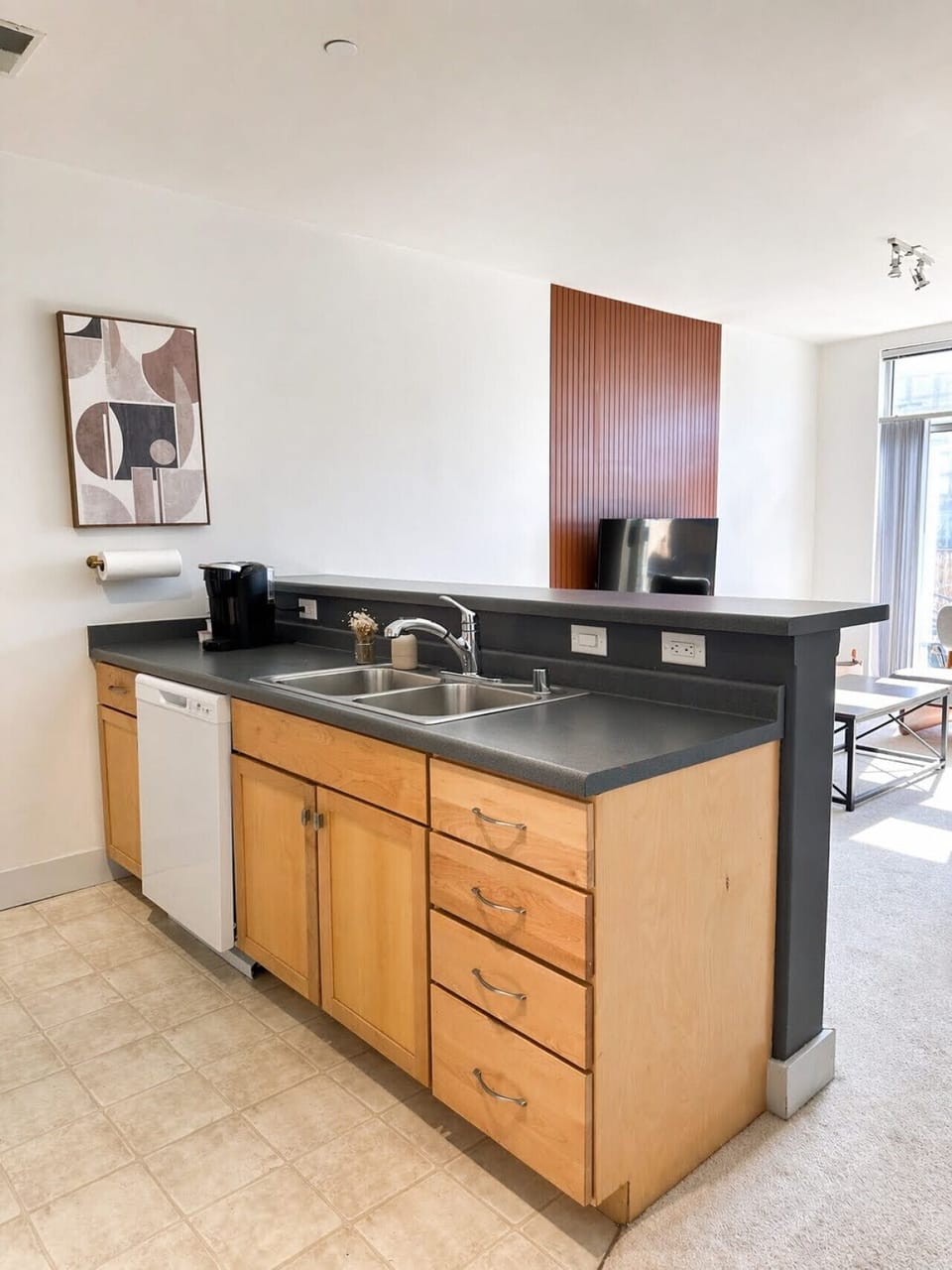 A fully-equipped kitchen with a breakfast bar for casual dining—everything you need to prep, cook, and refuel