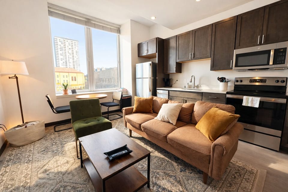 Relax or catch up on emails in this open-concept living space designed for productivity and comfort
