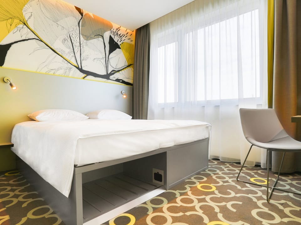 Family Room | Premium bedding, blackout drapes, soundproofing, iron/ironing board