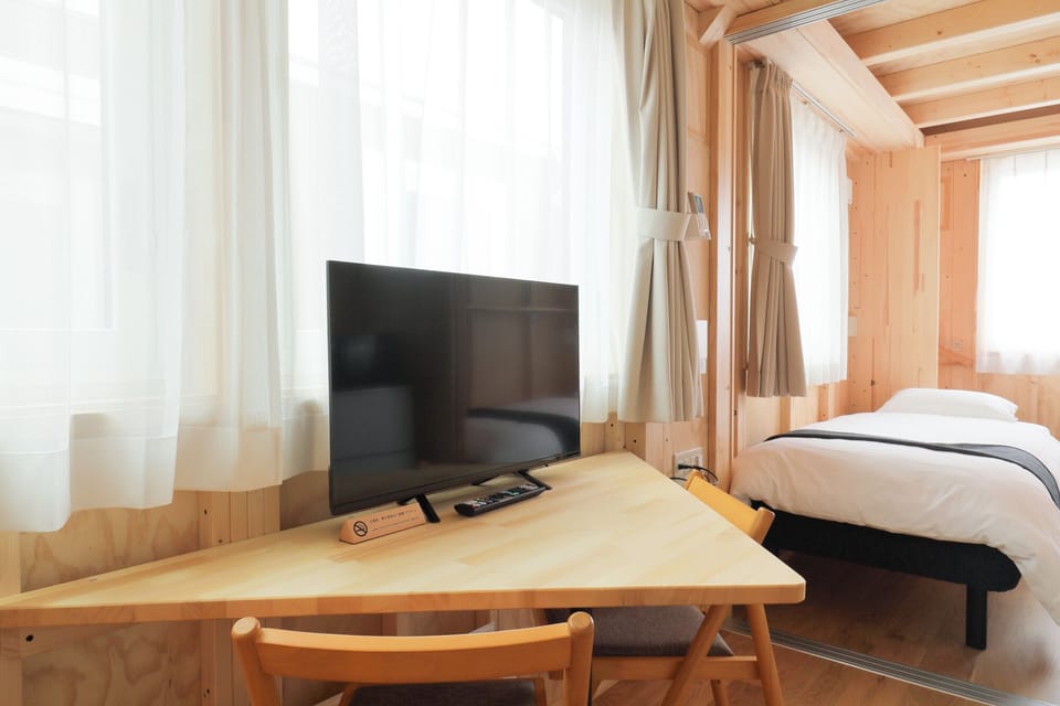 Quadruple Room | Television