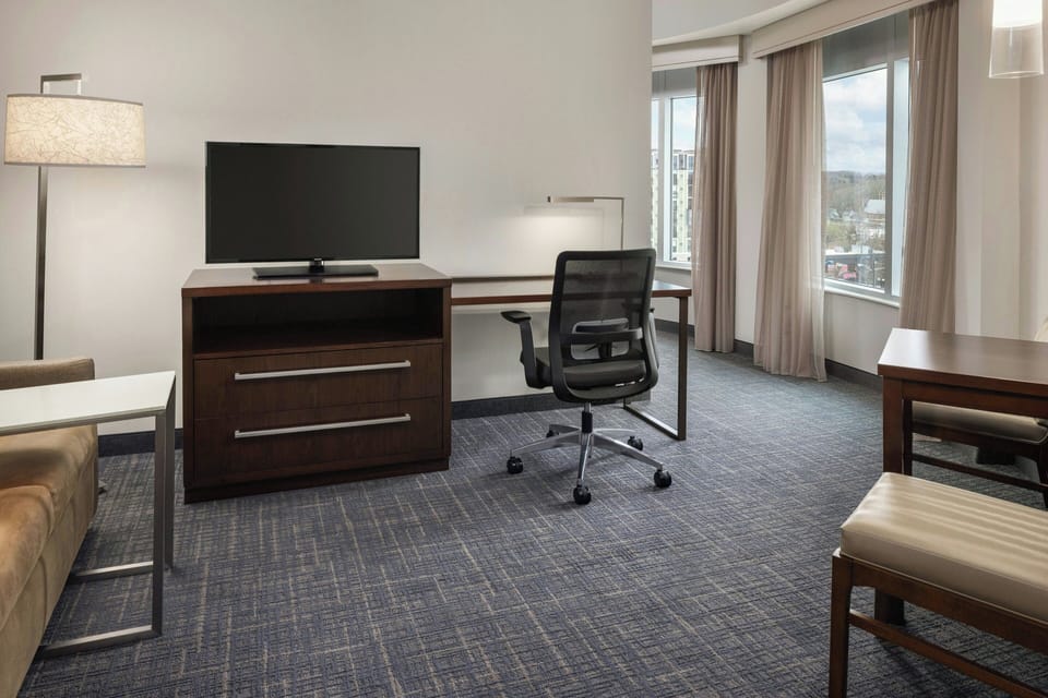 Panoramic Studio Suite, 1 King Bed with Sofa bed | Living room | 32-inch Smart TV with cable channels, TV, Netflix