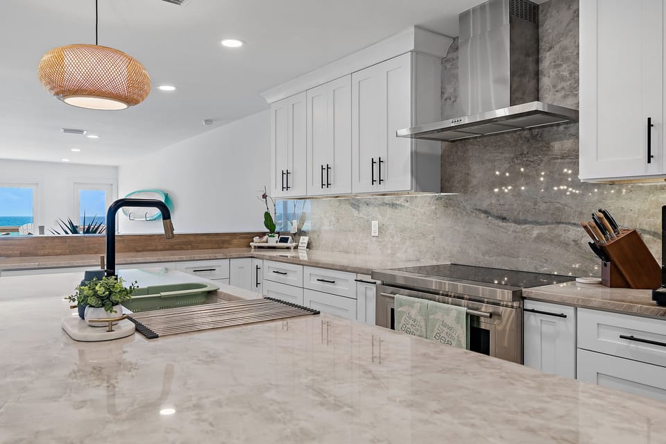 CHEF'S KITCHEN - With Wolf and Viking Appliances and High Quality Cookware, imagine preparing meals for your group with those incredible Gulf Views!