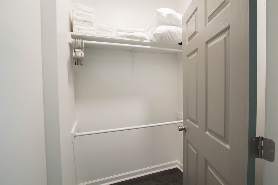 Walk-in closet with storage for longer stays