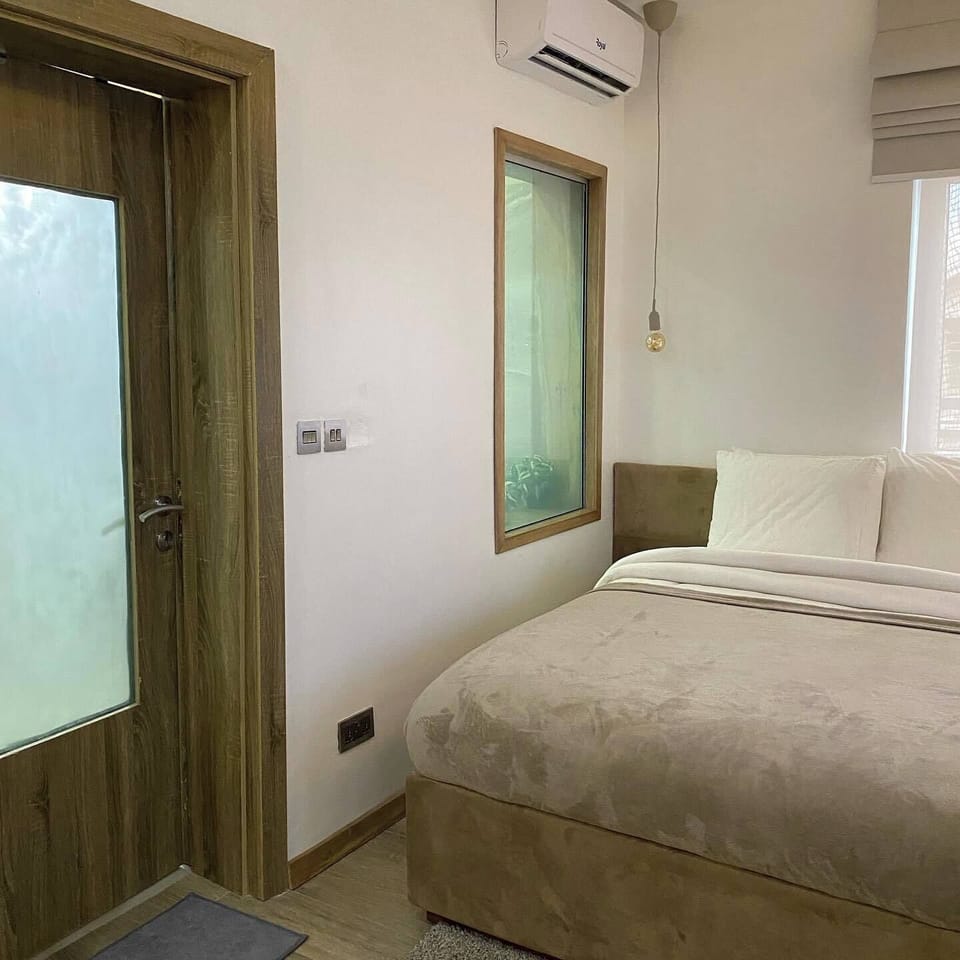 Family Apartment, Balcony, City View | Desk, laptop workspace, blackout drapes, soundproofing