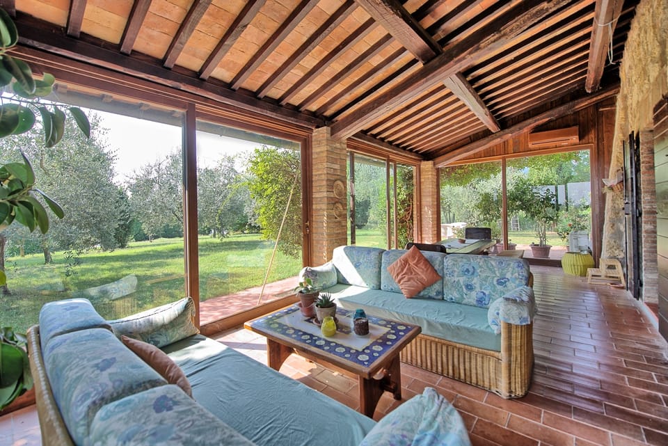 Panoramic Villa, 3 Bedrooms (Casale Giulio) | Living area | Flat-screen TV