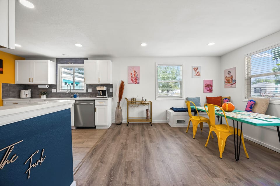 Gather easily in this home’s open layout, filled with light and style.