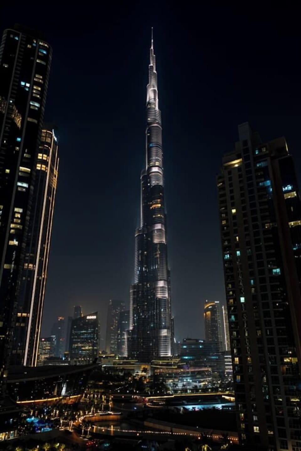 Dazzling Downtown Dubai lights and the Burj Khalifa—your nightly backdrop.
