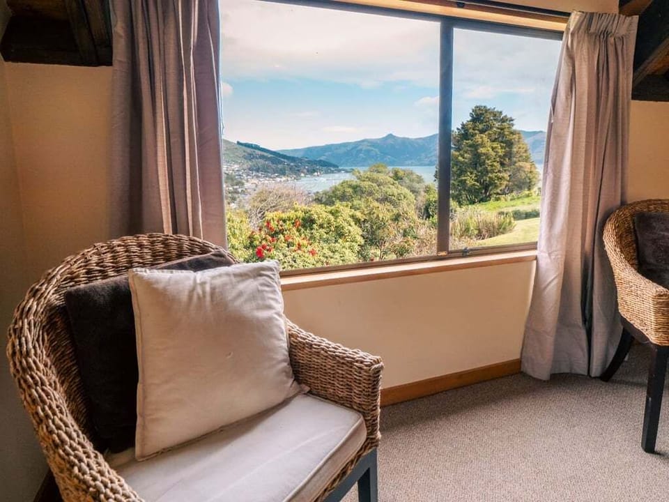 Seating areas in the master bedroom with an amazing view