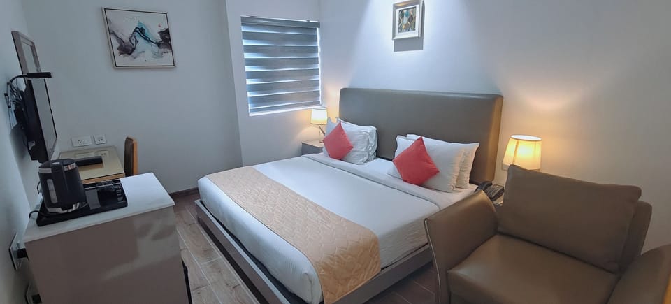 Premium Double Room | In-room safe, desk, laptop workspace, blackout drapes