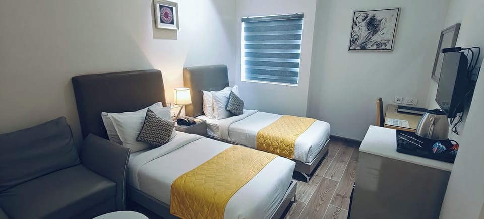 Premium Twin Room | In-room safe, desk, laptop workspace, blackout drapes