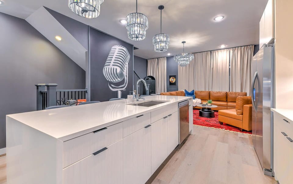 Room for everyone, gather around this open concept kitchen and living room
