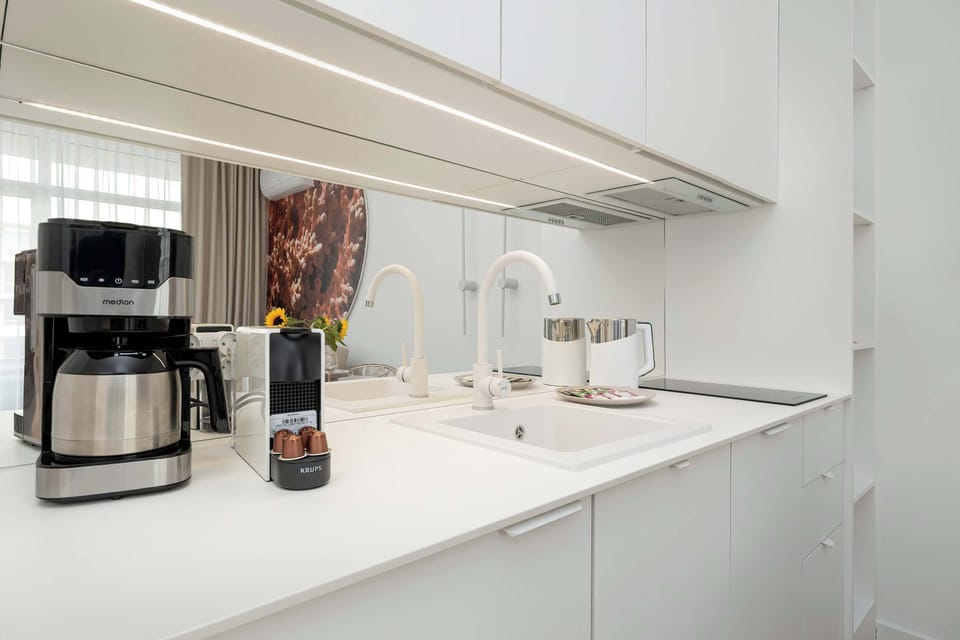 The fully equipped kitchenette includes everything you need for a home-cooked meal.