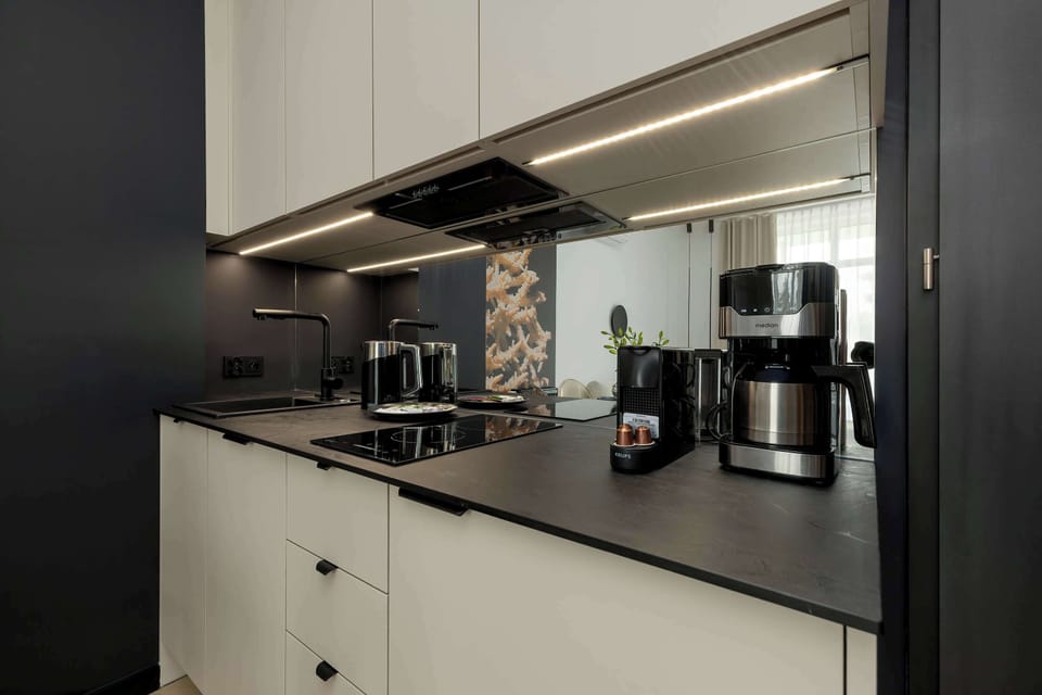 The kitchenette's practical layout maximizes space and functionality.