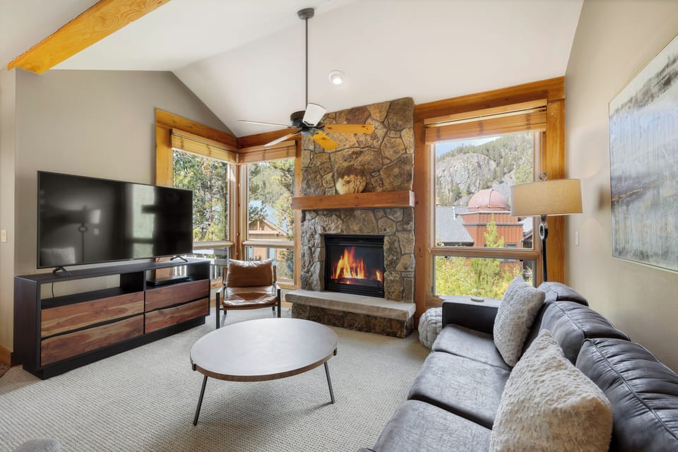 Cozy Living Room with Fireplace and TV