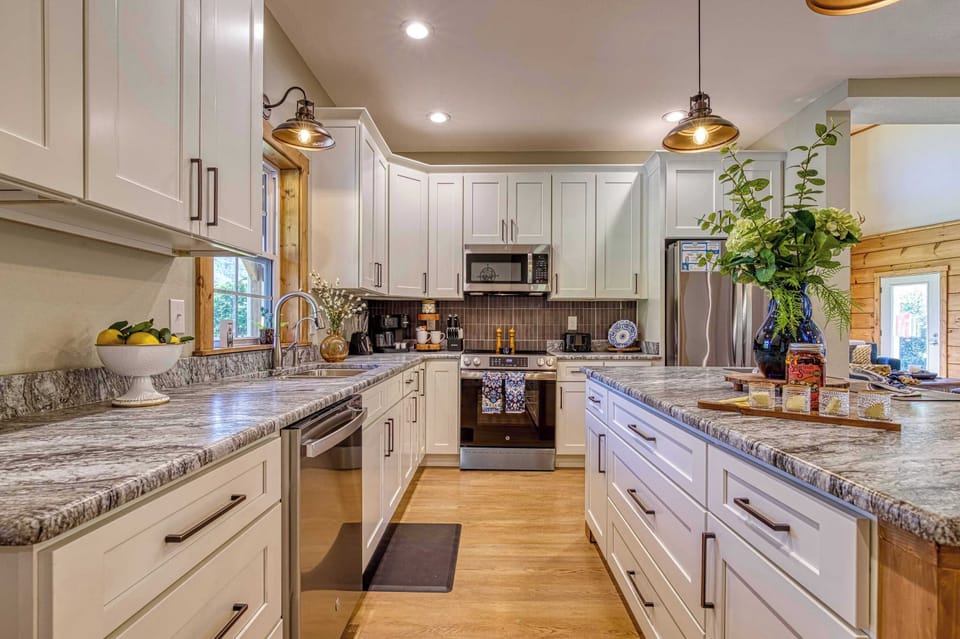 Prepare your favorite dishes in this high-end kitchen featuring premium finishes and thoughtful luxury touches.