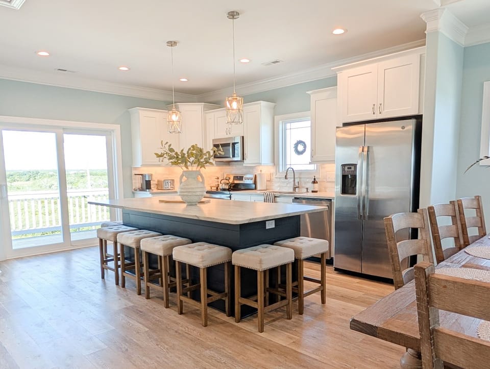 This kitchen island is so large, its going to fit so much incredible food on it.