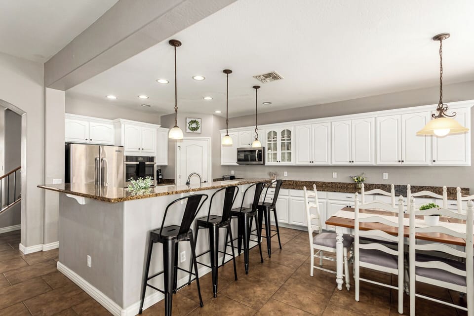 Bar height seating in kitchen.