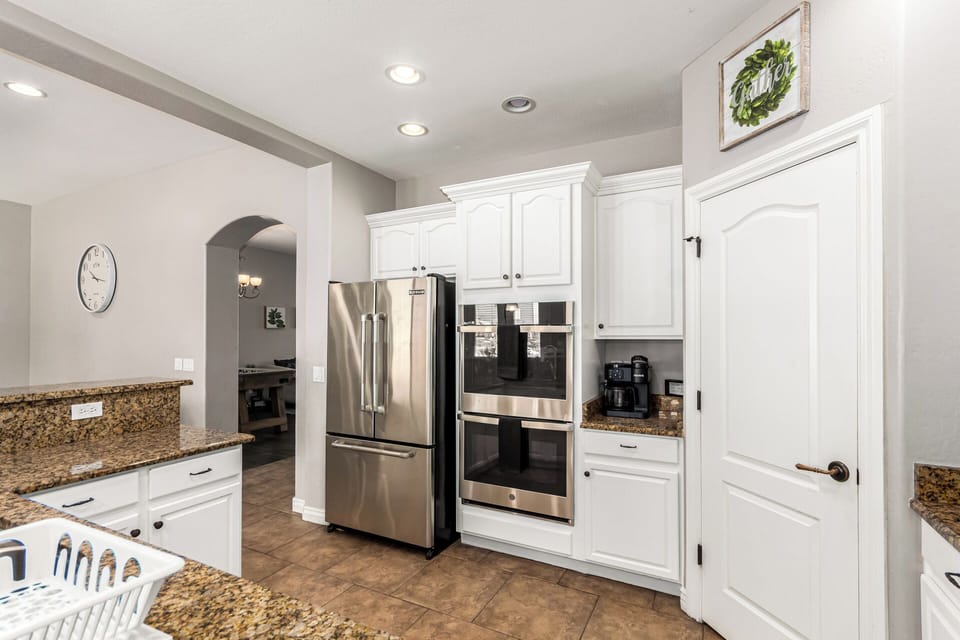 Double ovens, coffee station and more in the kitchen. 
