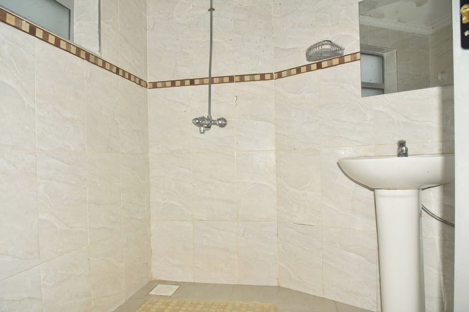 Shower, slippers, towels, soap