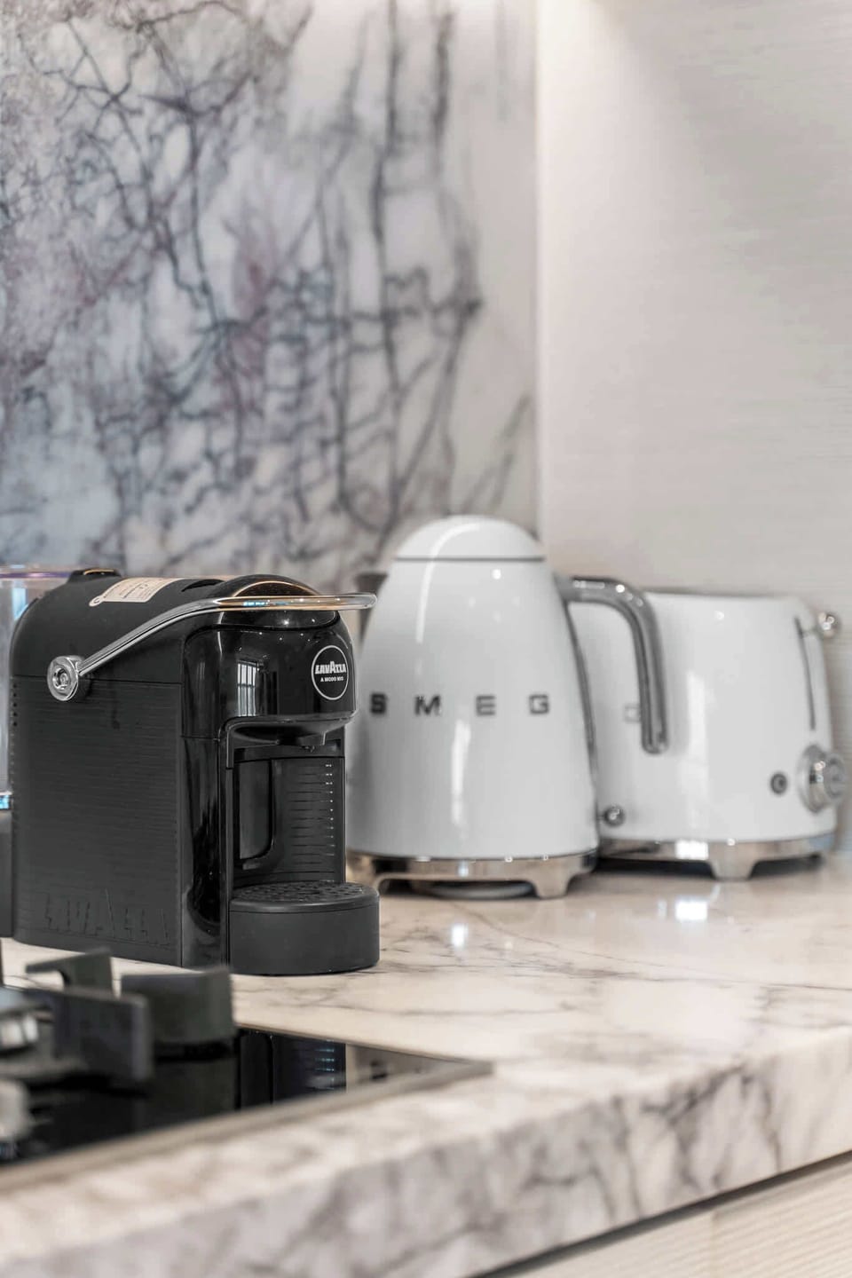 Fitted with high-end SMEG appliances and a Lavazza coffee machine with complimentary pods, every detail is designed for comfort and convenience.