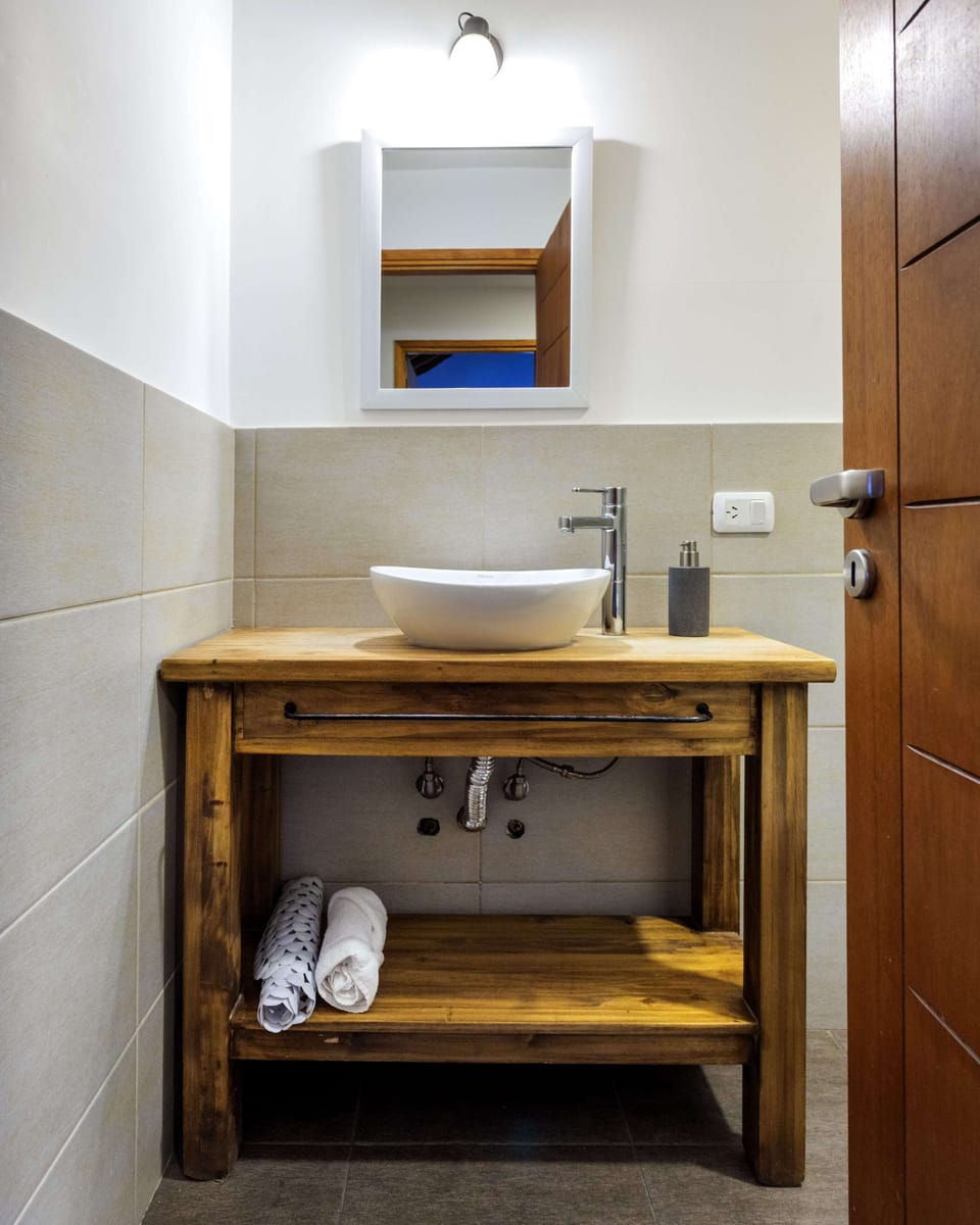 Bathtub, hair dryer, towels, soap