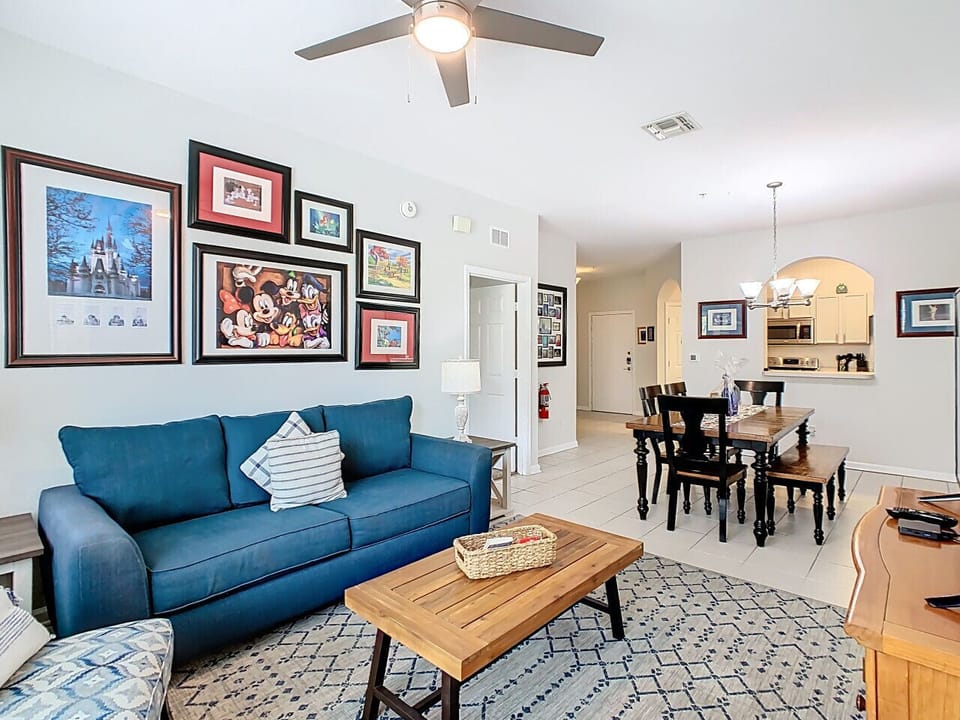 Relax after a fun day at the parks in our cozy living room, complete with comfy seating, a flat-screen TV, and Disney-inspired touches the whole family will love