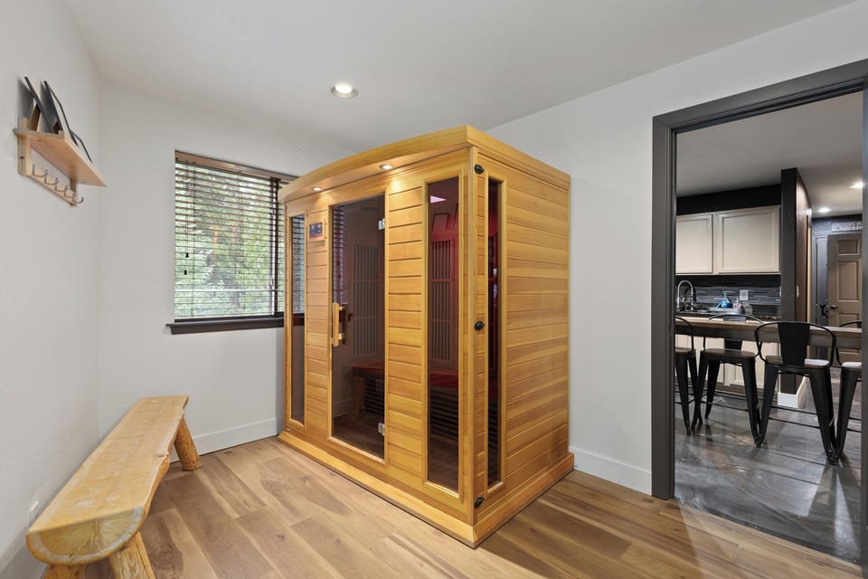 Detox and recharge in your private indoor infrared sauna, featuring therapeutic chromotherapy color lighting for the ultimate spa experience.