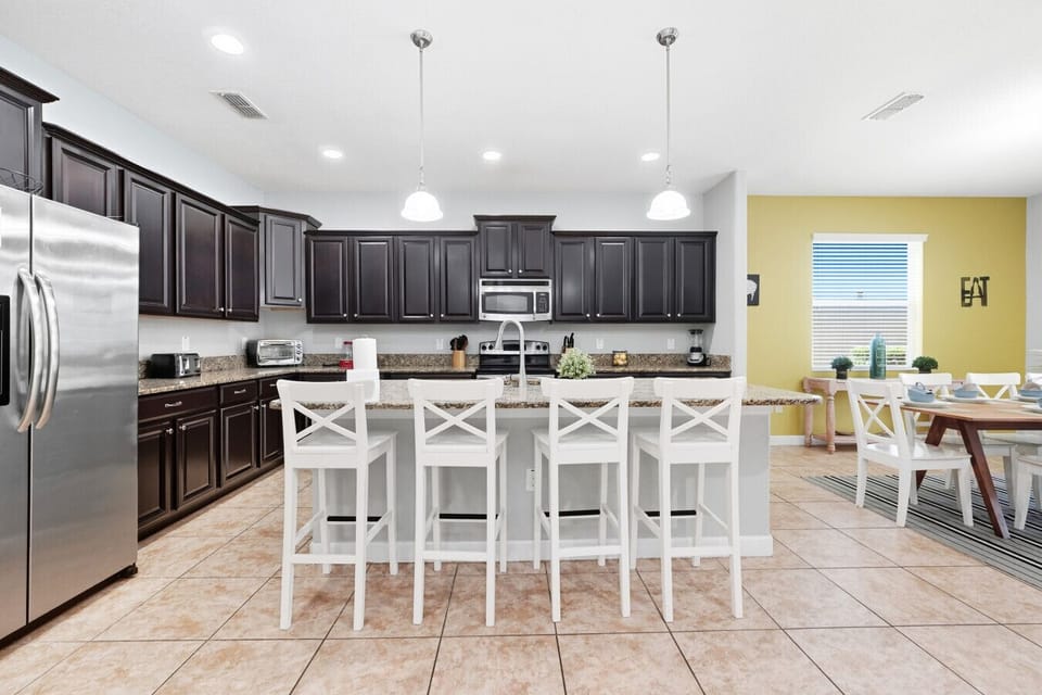 Spacious kitchen with island bar seating