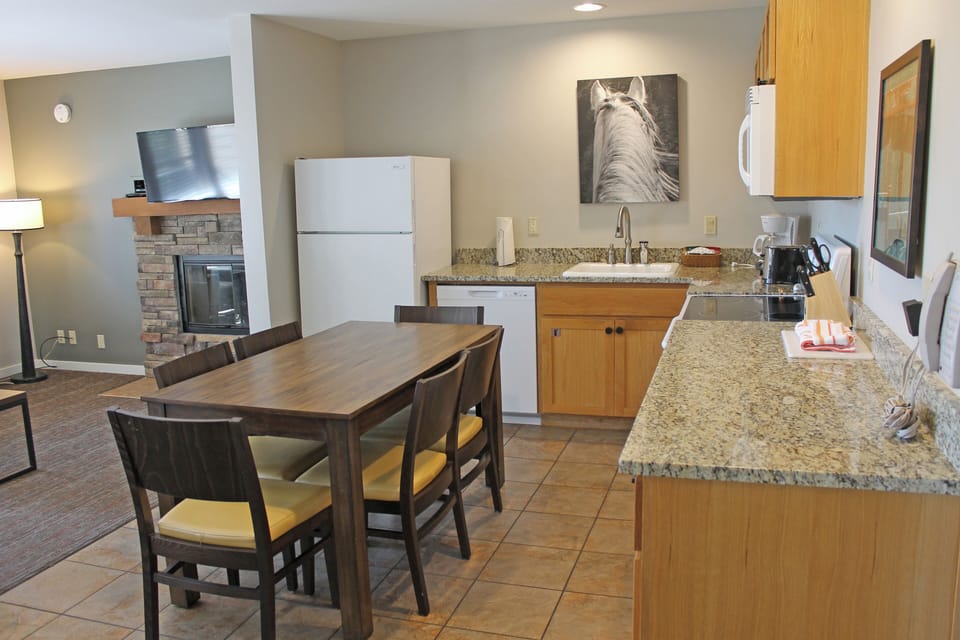Down the hall, the open Kitchen, Dining, Living
