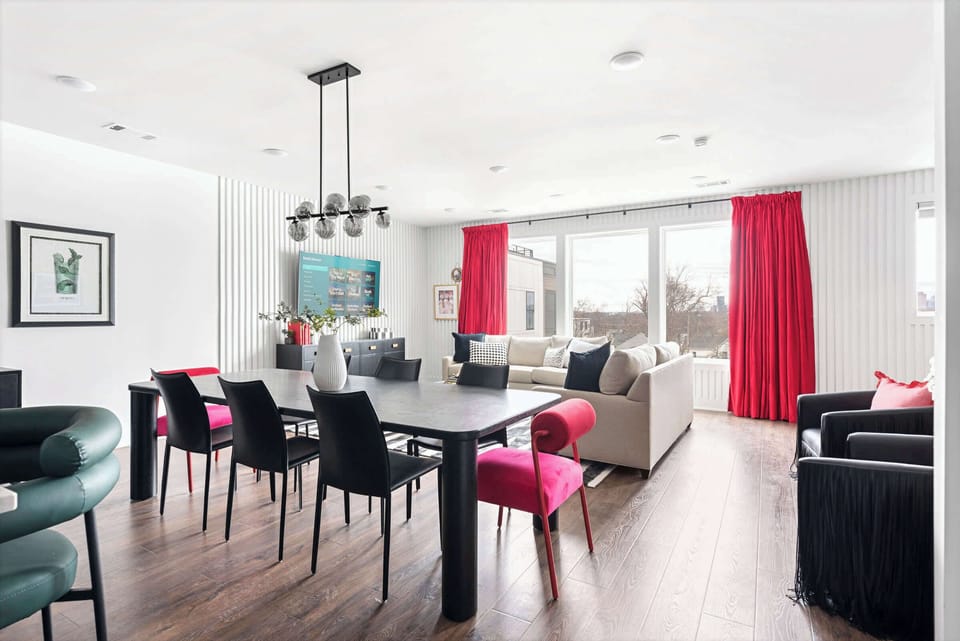 The dining table seats your whole crew at once, with the kitchen steps away and the living room right there so the night flows from eating to hanging without moving far