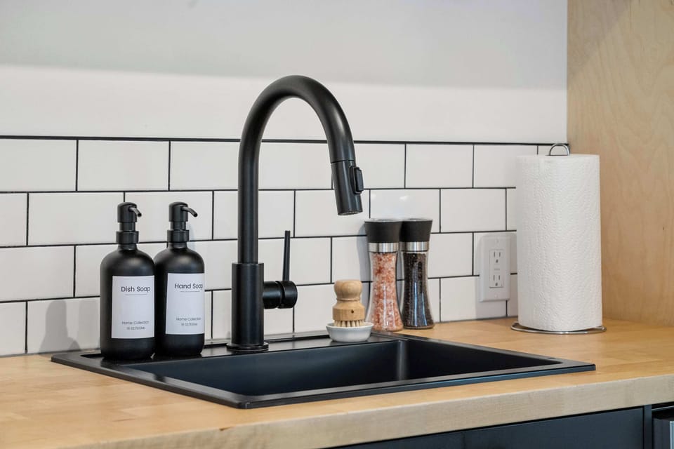 Modern sink with matte black faucet