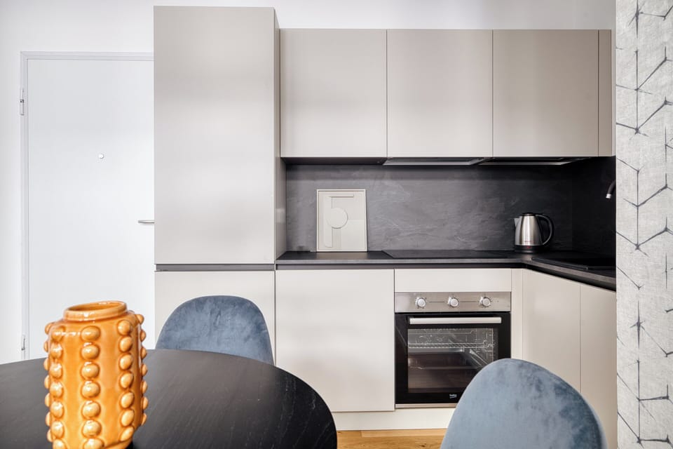 Apartment, 1 Bedroom | Private kitchen | Electric kettle, dining tables