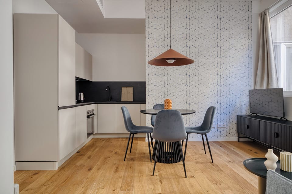 Apartment, 1 Bedroom | Private kitchen | Electric kettle, dining tables