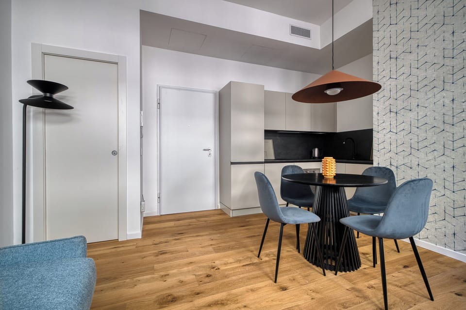 Apartment, 1 Bedroom | Private kitchen | Electric kettle, dining tables