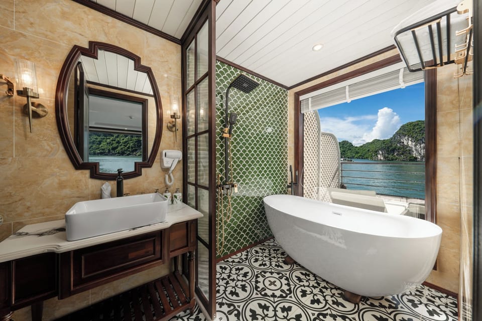 Family Room, Bay View | Bathroom | Rainfall showerhead, designer toiletries, hair dryer, bathrobes