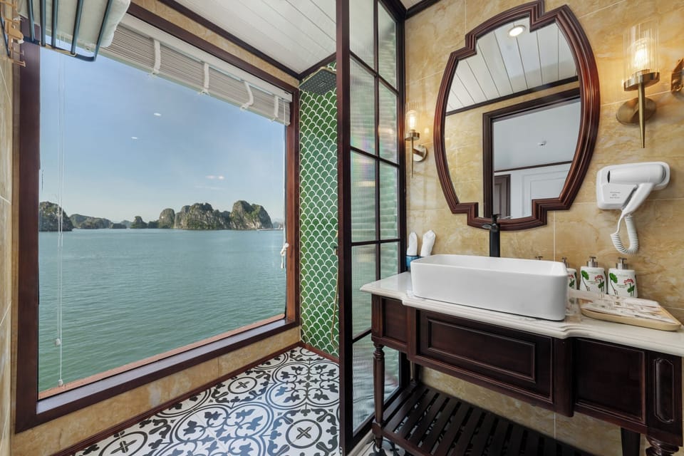 Deluxe Cabin, Bay View | Bathroom | Rainfall showerhead, designer toiletries, hair dryer, bathrobes
