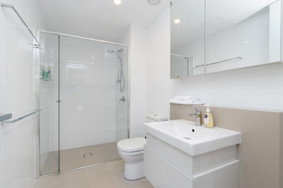 Spotless bathrooms designed with clean lines and calming simplicity.
